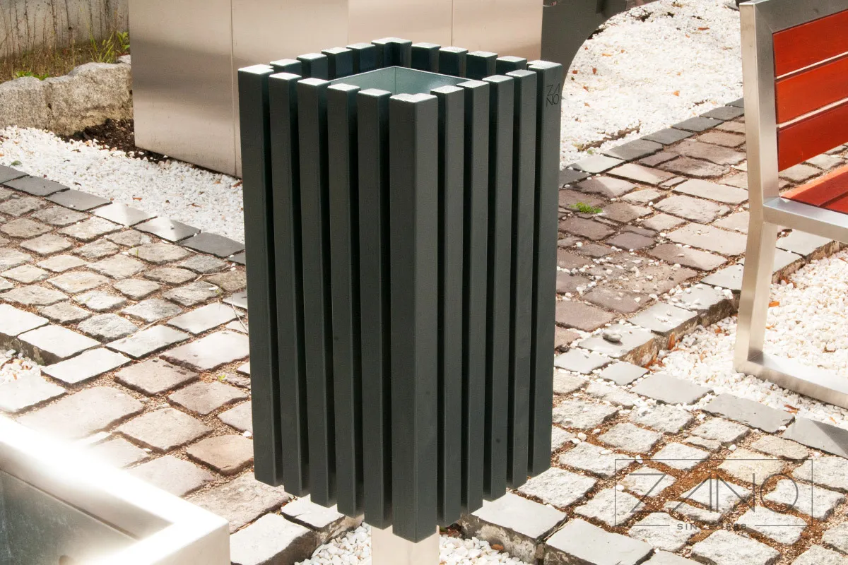 Papperskorg av rostfritt stål med detaljer i gran