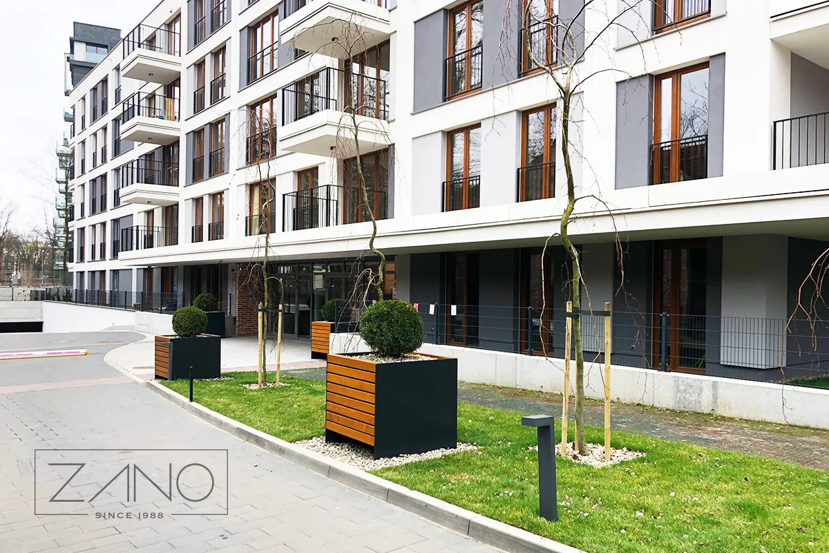 Modernt bostadsområde i Kraków | planteringskärl för träd